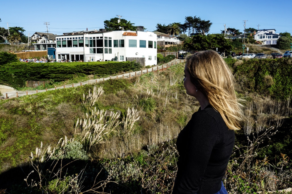 View of the haunted Moss Beach Distillery from the bluff. 