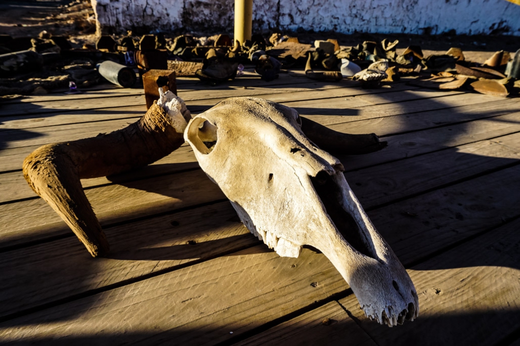 Circle of personal belongings left in abandoned town of La Noria in Chile. 