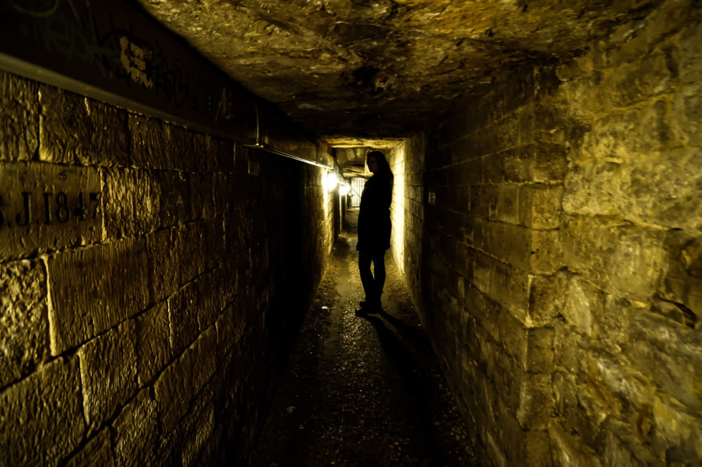 Dark Tunnels of the Catacombs of Paris. 