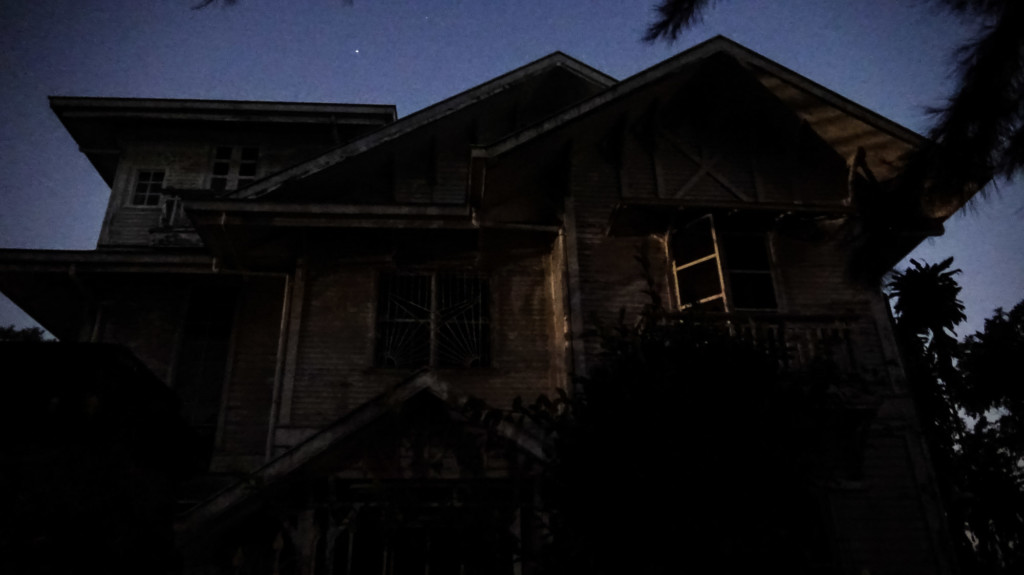 A nighttime view of the infamous and haunted Laperal White House. 
