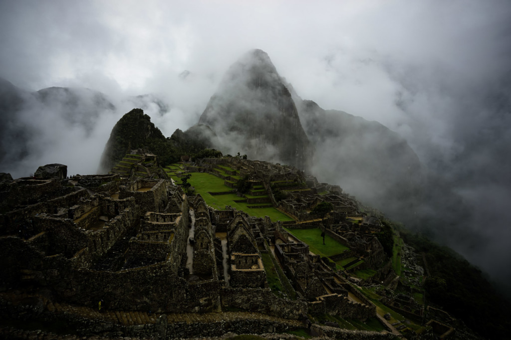 Heavy fog lingering over Machu Picchu, Peru. 