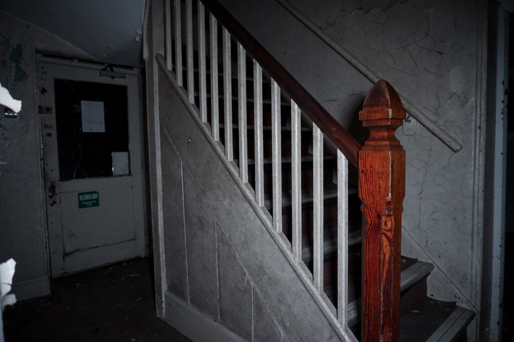 Staircase in the abandoned Bron Y Garth Hospital. 